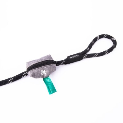 Accesorio gris con bolsas para los desechos Accesorio gris con bolsas para los desechos